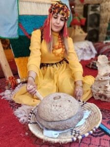Five Ways a Moroccan Berber Woman Honors Handicrafts Daily Moroccan berber woman grinding wheat